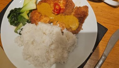 Chicken katsu curry with stir fried bak Choi