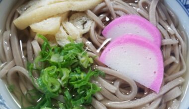 What is the purple and white thing in the dish?