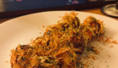 Enjoying some "takoyaki" while watching the World Series