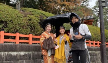 Kimono Girls posing with Rickshaw Runner, Gion District, Kyoto.