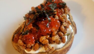 Surprisingly good, natto on marble rye, scallion sour cream, salmon egg and seaweed