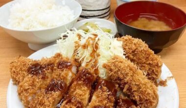 Delicious Tonkatsu set meal topped with fried oysters! So crispy and juicy!