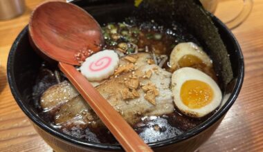 Burnt shoyu ramen & hot tea at Kinton Ramen in Toronto