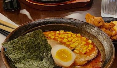 Tonkotsu spicy ramen with ajitama, corn, pork chashu, and seaweed