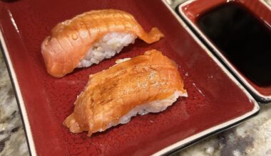 Homemade homecaught wild coho salmon belly nigiri lightly torched