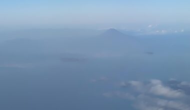 Passing just off the coast of Japan with a view from of Mt. Fuji while on a flight from Taipei to San Francisco. November, 2023