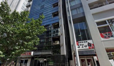What is this building with completely blacked out windows and no signage?