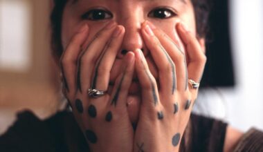 These sacred tattoos were banned in Okinawa. A new generation is bringing them back.