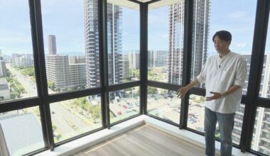 The upper floors of a new high-rise apartment building are unoccupied. Foreigners who don't understand Japanese purchasing rooms in one lump cash payment for investment. [Fukuoka]