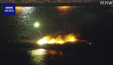 A barge launching fireworks at the Yokohama Fireworks Festival venue is on fire.