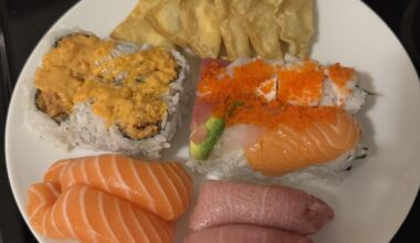 Cheese wonton, spicy tuna roll, rainbow roll, sake nigiri, otoro nigiri