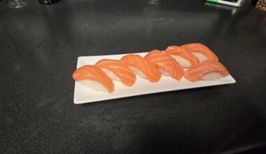 3rd attempt making salmon nigiri! The slices are THICK i know, that was not intentional lol. In the close up Pic, however, I am wondering what the tiny little baby white lines are that look kinda like mini tears? Is this ok? Along cuz i haven't seen that yet before.