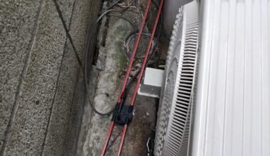 Aircon leaking indoors, clean drain from inside?