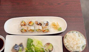 Spider roll, 15 pc sashimi platter, chicken karaage and tamara plum wine spritzer at Nagi Sushi in Ottawa, Canada