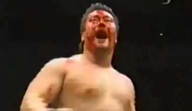 A bloody Kensuke Sasaki powers Bob Sapp up for a huge Northern Lights Bomb [03.28.2004]