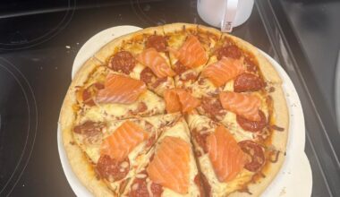 Heard this is big in Japan. Salmon sashimi pizza.