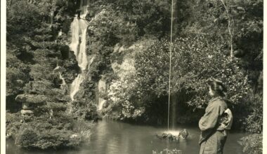Girl by a tea house garden pond/fountain