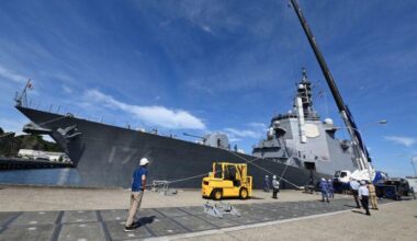 Japan is arming a warship with US missiles that can hit targets up to 1,000 miles away as Pacific arms race heats up