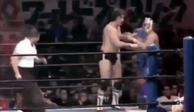 Tiger Mask nukes Bret Hart with a springboard dropkick