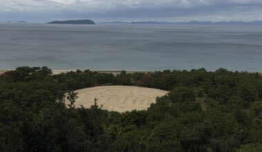 A giant 'sand coin' in Japan called Zenigata Sunae. Built in 1633 to welcome a local lord, it's over 120 meters wide. Legend says seeing it will grant you a life free from money troubles.
