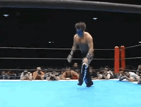 The Great Muta working over Manabu Nakanishi!