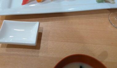 Alone at busy sushi restaurant in northeast, usa