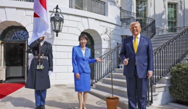 Prime Minister Sanae Takaichi and U.S. President Donald Trump posed for a commemorative photo at the White House with a cherry tree sapling donated by Japan, prior to their meeting