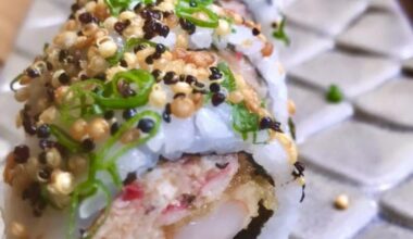Shrimp and crab roll topped with crispy quinoa and fresh scallions