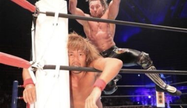 A picture of Kenny omega about to hit Tetsuya Naito with a v trigger