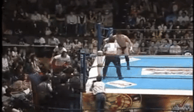 Prince Devitt (Finn Balor) overshoots & ends up in the front row