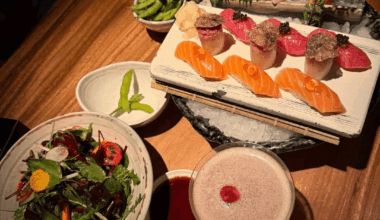 Nigiri with salmon and tuna, sashimi, and salad