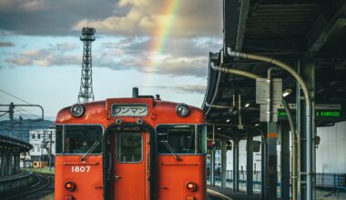 A rainbow over a local KiHa 40 train at Hakodate Station, Hokkaido.