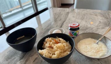 [Homemade] A Japanese breakfast that feels like home to me — takikomi gohan, soup, egg, yogurt, and Gohan Desuyo