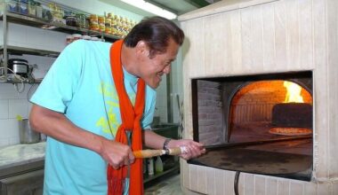 Antonio Inoki working the pizza oven in Sicily in 2005