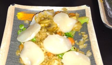 I ate the fried rice at my local Japanese AYCE with the scallop and prawn sashimi and octopus salad. Best fried rice I've ever had, and I'm going to try it with their scallop and calamari skewers next time!