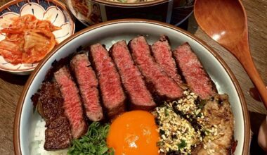 This donburi hit different - seared beef, foie gras, and runny yolk over rice🤤