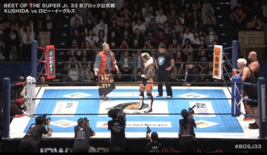 Robbie Eagles pointing to the PH flag patch Against Kushida.